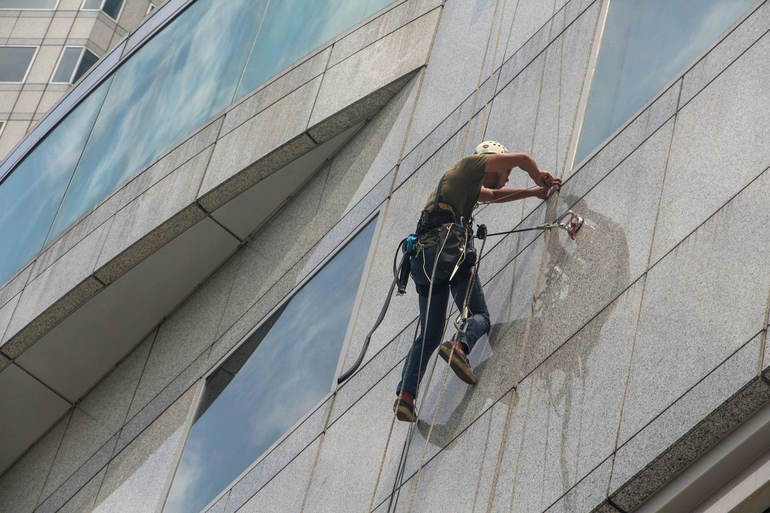 Facade woman, window, cleaning